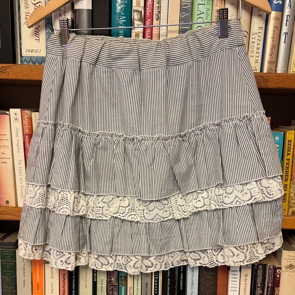 Women’s layered pinstripe and lace skirt